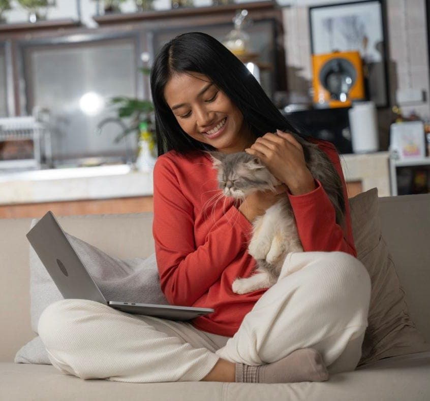 Happy pet owner with dog